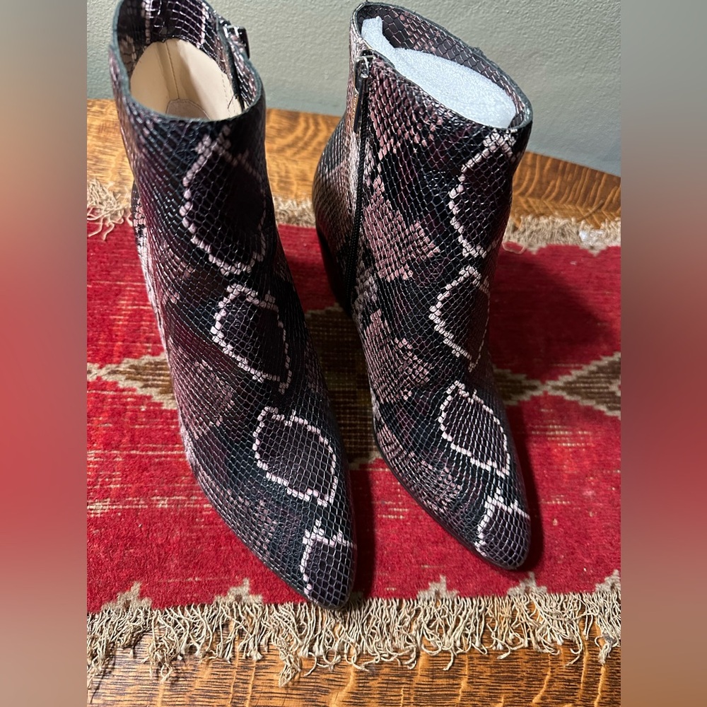 Brand new Vince Camuto 91/2m boots.Mauve multi tri colored snake print.
